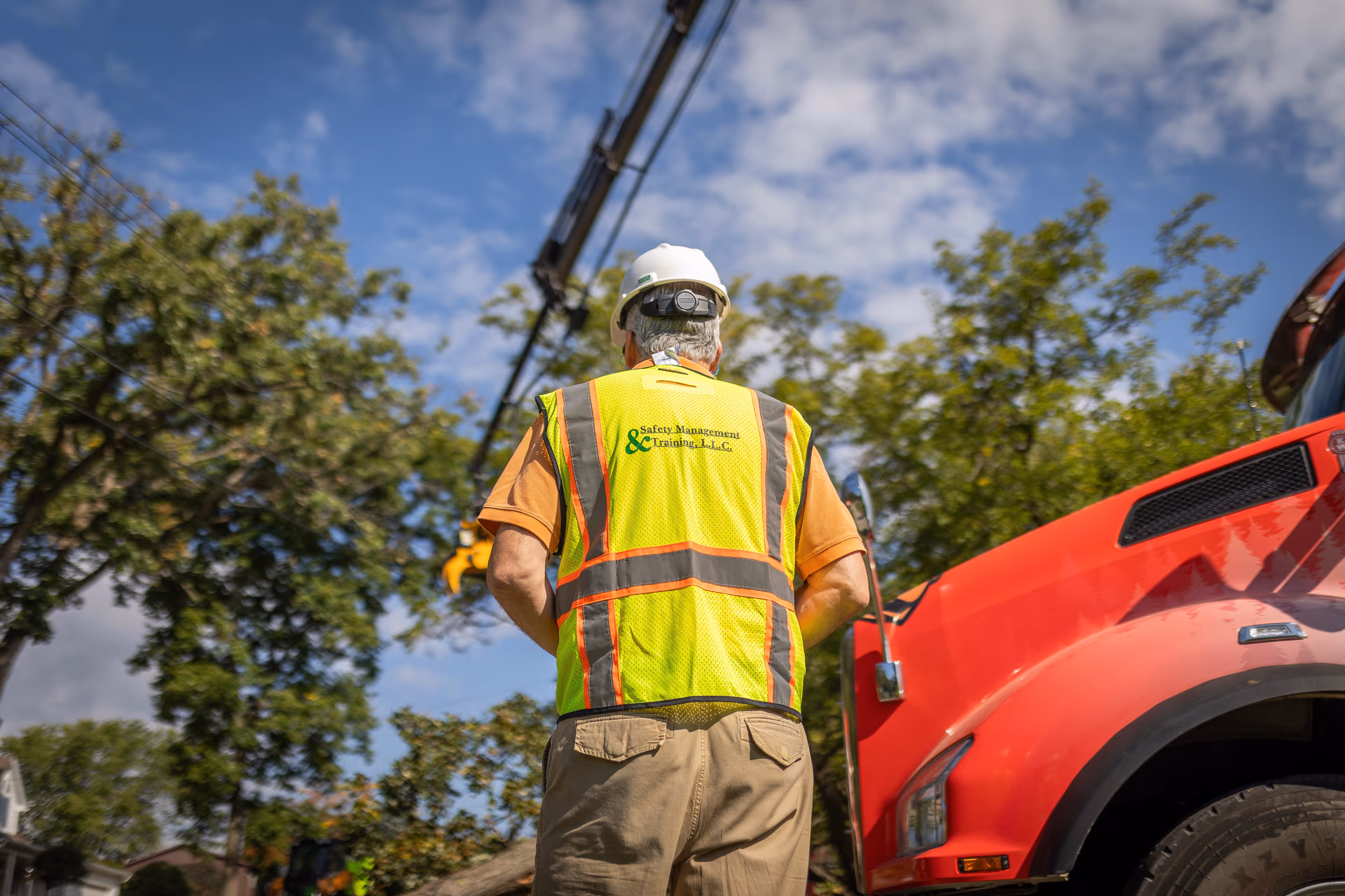 Tree Wise Men ISA Certified Arborists supervising a crane tree removal