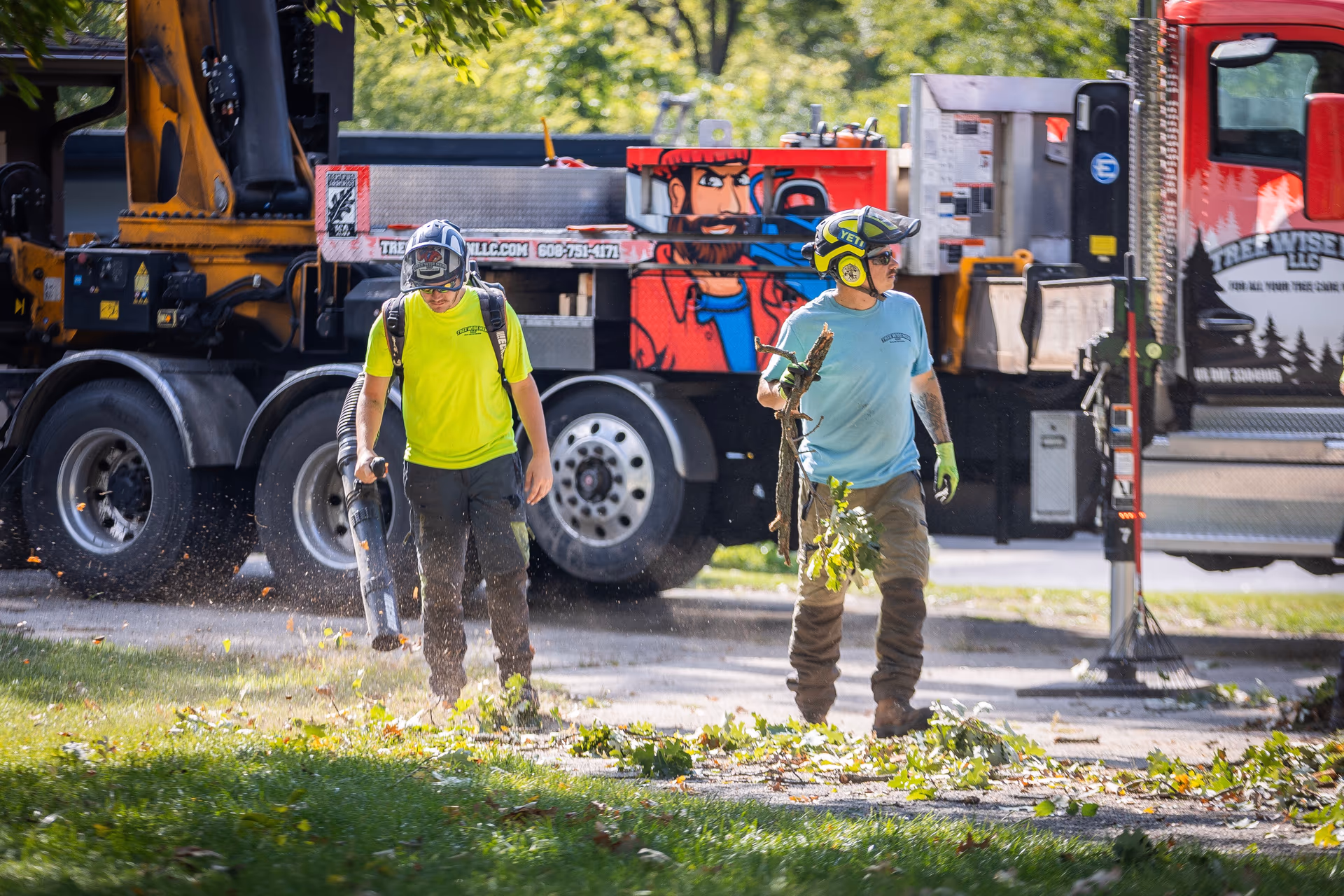 Tree Wise Men crew walking a job site during a tree health assessment