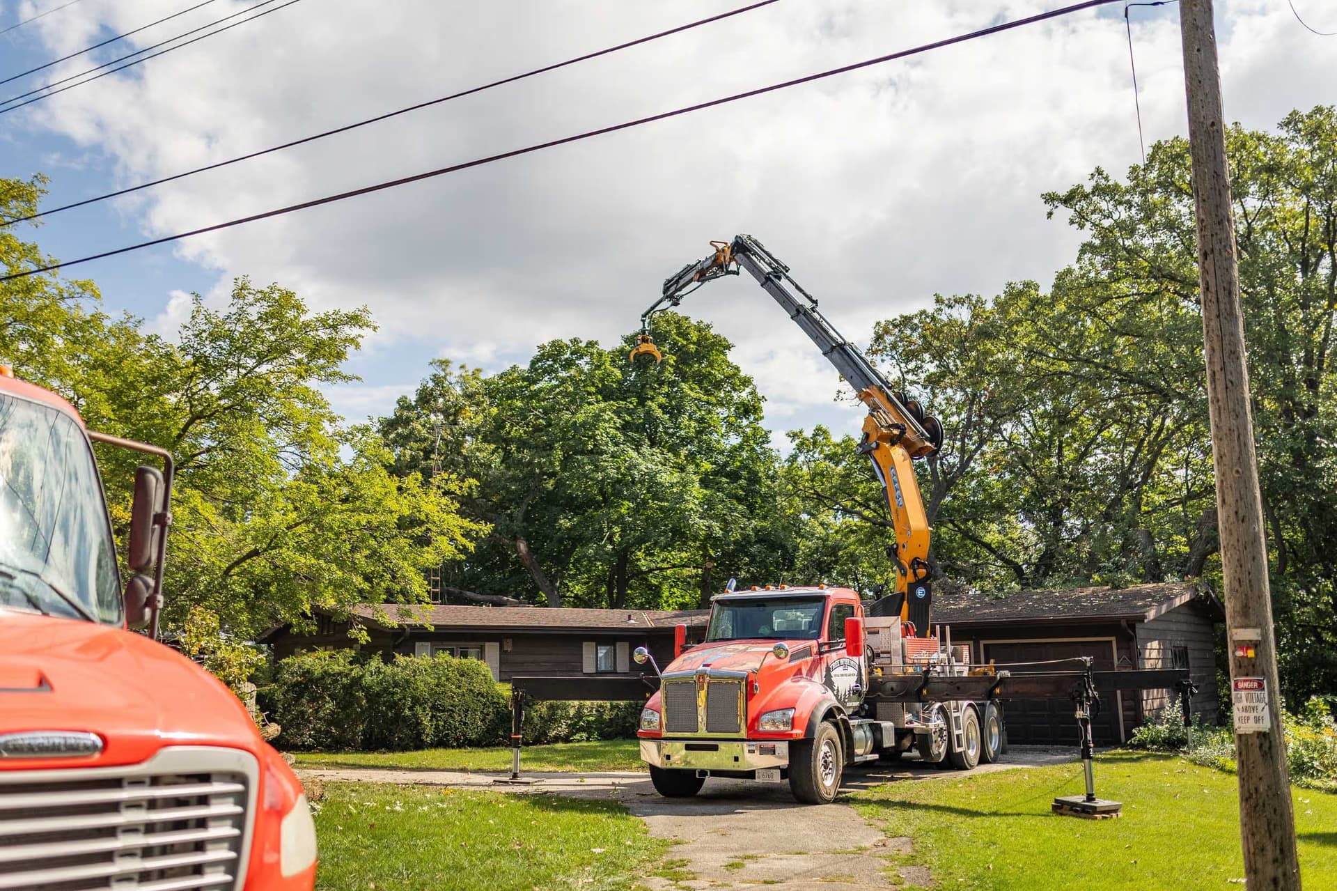 Emergency tree removal after a tree fell on a Wisconsin house